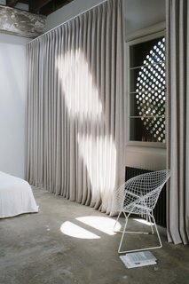 Cor-Ten steel shutters give the Little Space more security during long periods when the occupants are traveling.