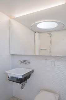 The Little Space has fully insulated perimeter walls and is heated with a single radiator. New radiant heating in an exposed concrete floor was also provided for the bathroom. 