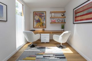 One of the four bedrooms is currently being used as an office space. 