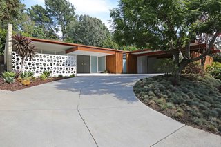 The facade features a clean and classic midcentury profile.