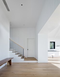 The three guest bedrooms sit over the garage/boathouse.