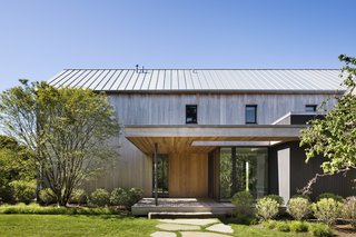 The unfinished cedar planks will develop a silvery patina over time. 