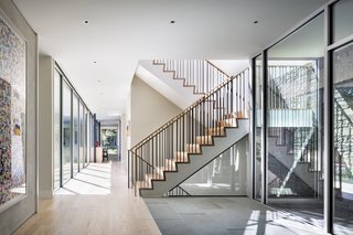 The ground floor consists of the public space with ample room for entertaining, while all the private living spaces have been delegated to the second floor. 