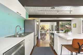 Here is a view of the kitchen from another angle looking into the living spaces. 