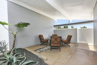 The enclosed courtyard with a fire pit. 