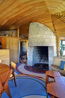 The concrete block fireplace. 