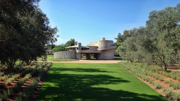 The home is set at the base of Camelback Mountain and looks out toward the surrounding desert.