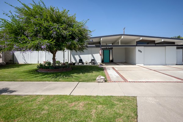 Solid post-and-beam construction gives the home a classic midcentury profile.