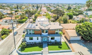 The expansive home features six-bedrooms with ensuite bathrooms, plus two additional half-baths. 