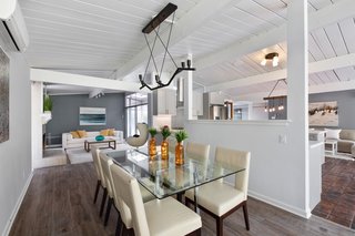 Here, you can see how the kitchen has been inserted into the center of the living space for easy entertaining.