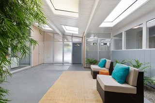 The front door brings you directly into the center atrium, providing a seamless transition between indoors and out. 