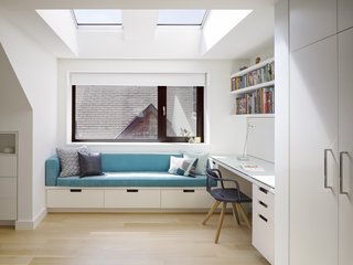 The second-floor bedrooms feature built-in office nooks with storage. 
