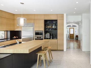 At the back of the home, a new extension includes a spacious, modern kitchen. 