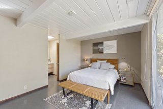 Another one of the bedrooms features an ensuite bath.