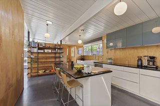 Here is a peek at the center island with breakfast-bar seating that allows for casual dining. 