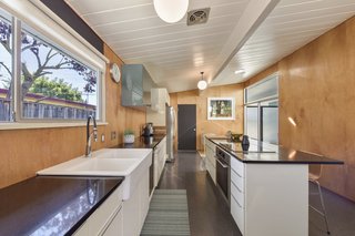 The updated chef’s kitchen features lots of workspace and ample storage. 