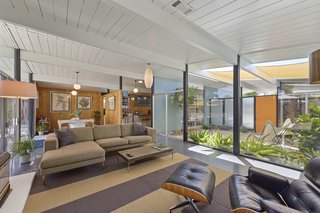 Expansive walls of glass bring a strong sense of the outdoors in. 