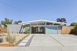 Beautifully renovated, the home has excellent curb appeal with low maintenance landscaping.