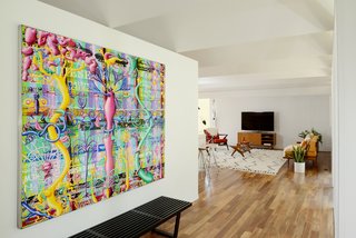 The entry leads to the open-plan living room. 