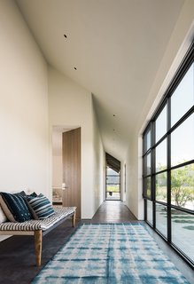 Despite the modern material palette, the home also boasts a traditional flair.