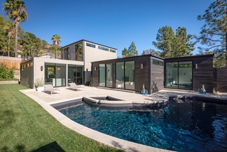The backyard gives a clear view of the modular construction. 