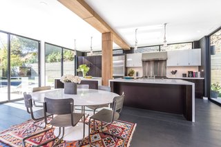 Bright interiors are thanks to high ceilings and ample glazing. 