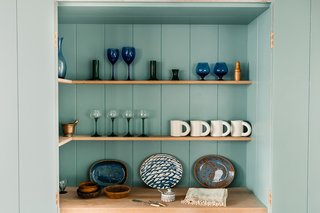 Bespoke kitchen shelving provides a beautiful space to display special pieces.