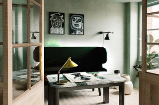 A closer look at the study with a customized dark-green lacquer bench and a terrazzo table from Sue Skeen in collaboration with The New Craftsmen. 