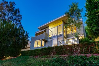 A view of the home at night. 