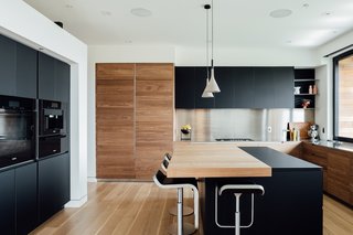 Finding the right fixtures to match the style Axboe was looking for was a challenge, but eventually, she was able to achieve a contemporary, yet warm and inviting look. 
