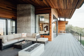 The cedar-lined terrace has a fire pit which provides excellent additional space for outdoor entertaining. 