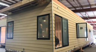 Designed by Toby Long, this custom home was built by Plant Prefab and destined for a spectacular site in Livermore. 