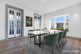 The dining room features a bay window.