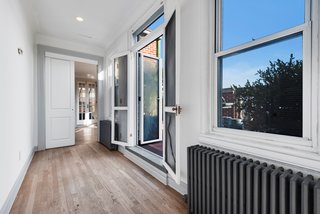 A door leads out to the terrace. 