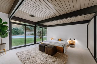 The master bedroom also has sliding doors that lead out to the pool. 