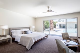 There are two master suites, both of which feature stand-alone tubs and walk-in showers.