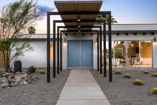 The property's former Spanish hacienda-style, red-tile roof has been replaced with a contemporary metal one as part of the renovation. 