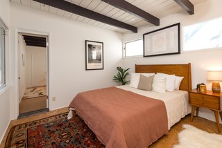 The home features three bedrooms in a private wing and two full baths. 