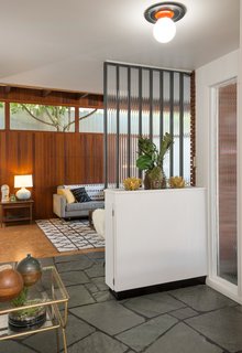 The slate entry features privacy glass. 