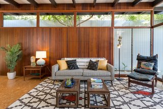 Wood paneling and clerestory windows add to the authentic midcentury charm. 