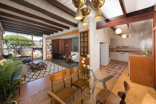 The kitchen is set just off the dining area. 
