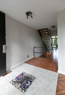 The mosaic in the entryway is a commissioned work by former Detroit–based artist Mary Bowman Cline.