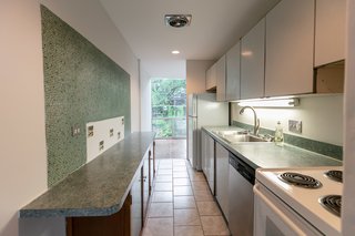  The tile squares in the kitchen are from the Detroit–based Pewabic Tiles.