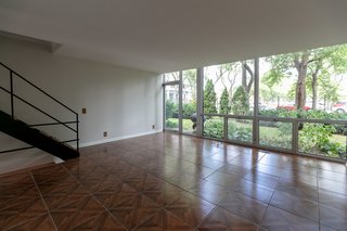 The back of the unit looks out onto a common courtyard. 