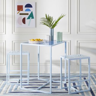 The three-piece metal and glass Valley Bistro set is perfect for a small kitchen or nook. 