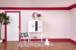 The Eye-Con Bar Cabinet is part of the cheeky "Wink of Pink" collection. 