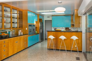 Although the kitchen has been updated for modern living, it still maintains an authentic midcentury sense of style. 