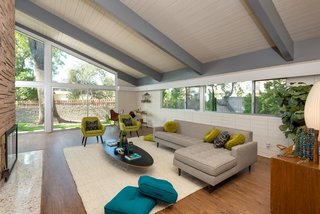 The tongue-and-groove ceiling is another classic midcentury feature.
