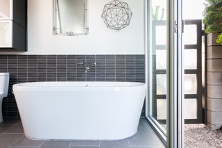 Sliding doors can be opened for a true indoor-outdoor feel. 