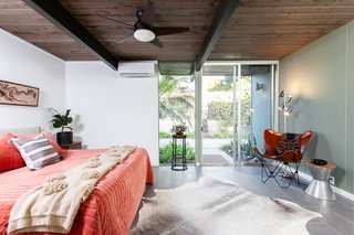 The master bedroom has French doors which lead to the outside.